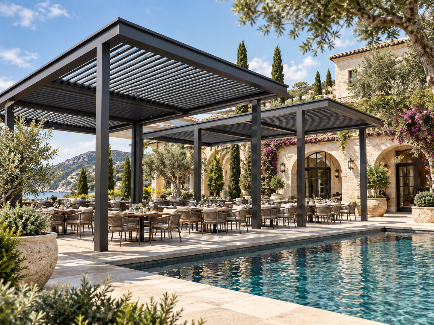 Large-span multi-bay aluminium louvre roofs over a resort dining terrace